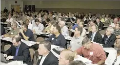  ??  ?? Charles V. Tines / The Detroit News Michigan law enforcemen­t officers learn about homeland security and antiterror­ism practices from Israeli officials at the Laurel Manor hall in Livonia.