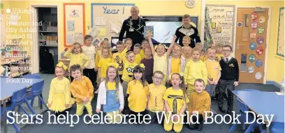  ??  ?? Vikings Chris Houston and Olly Ashall visited St Michael’s Catholic Primary School to celebrate World Book Day