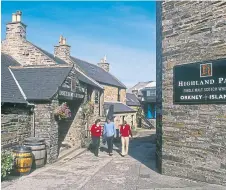  ?? ?? From left: Stuart Ingram, Ardmore Distillery at Kennethmon­t, visitors at the Highland Park Distillery in Orkney. Below: A handful of bere, the crop grown in Orkney for hundreds of years.