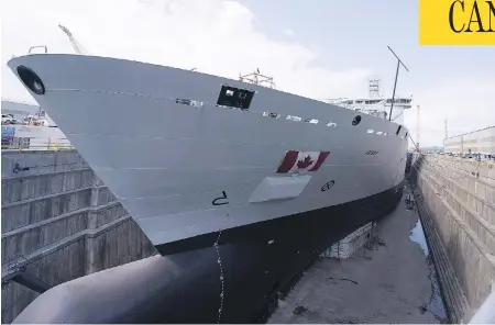  ?? JACQUES BOISSINOT / THE CANADIAN PRESS FILES ?? Royal Canadian Navy personnel will begin training on the Resolve-class naval support ship Asterix starting in January.