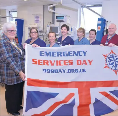  ??  ?? Expert care The Provost (left) chatted with doctors, nurses and paramedics at University Hospital Monklands’ A&E unit