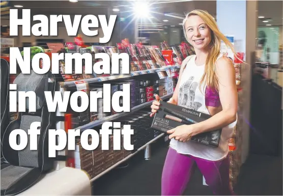  ?? Picture: DYLAN ROBINSON ?? ROBUST: Harvey Norman customer Ebonie Fielder- Still at the Kensington, Sydney, store. Harvey Norman profits rose 28 per cent.