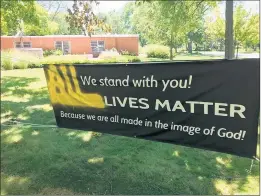  ?? SARRA LIND ?? A Black Lives Matter banner outside the Episcopal Church of St. John the Evangelist in Flossmoor was defaced to read All Lives Matter.