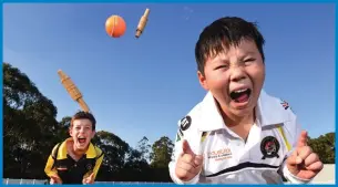  ??  ?? Southport Labrador cricket club’s Cooper Johnson and Kimi Zhu get into the spirit of T20 on the Gold Coast. Picture: John Gass