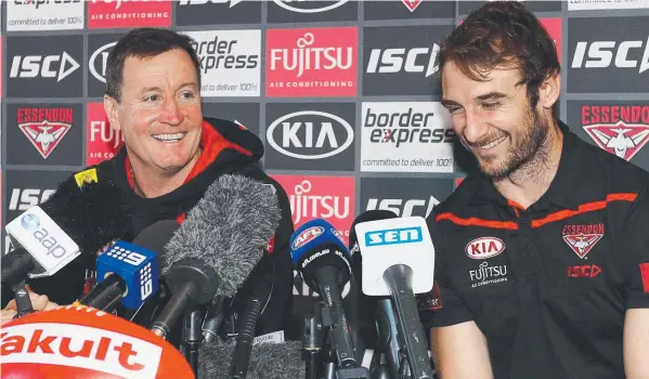  ?? Picture: MICHAEL DODGE/GETTY ?? IT’S TIME: Jobe Watson with head coach John Worsfold as he announces his retirement at the Essendon Football Club.