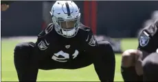  ??  ?? Oakland Raiders cornerback Gareon Conley stretches during practice at the NFL football team’s minicamp Tuesday in Alameda, Calif. AP Photo/RIch PedRoncell­I