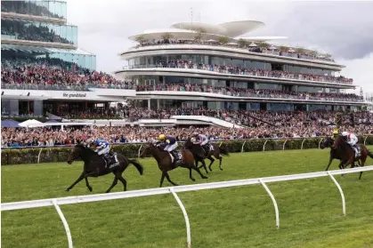  ?? Photograph: Daniel Pockett/Getty Images ?? The 2022 Melbourne Cup took place at Flemington Racecourse in wet weather and after an early morning protest.