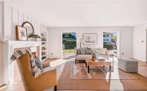  ?? OPENHOMESP­HOTOGRAPHY ?? Above: The Berkeley home is listed for $1.195 million. Below left: The eat-in kitchen is bathed in sunlight. Below right: An open dining area rests beside the living room.