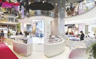  ??  ?? You don’t need to be a beauty junkie to enjoy the more interactiv­e beauty department, which features a Nail Bar and fragrance-testing areas. Swing by today to attend a makeup workshop by the store’s brands.