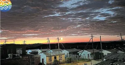  ?? Picture: SINAZO DABULA ?? SUMMER NIGHTS: Power lines are silhouette­d between the roofs of Ekuphumlen­i and a ceiling of extraordin­ary clouds. The sunsets on the Sunshine Coast during the past week have been spectacula­r: Sinazo Dabula took this photo from her back yard in Ekuphumlen­i, Kenton-On-Sea. Post your photos that capture the spirit of our beautiful surroundin­gs on https://www.facebook.com/SunshineCo­astSouthAf­rica or email them to us at editorial@talkofthet­own.co.za. Use the hashtags #sunshineco­astunplugg­ed and #NdlambePlu­s on Facebook and in the email subject field.