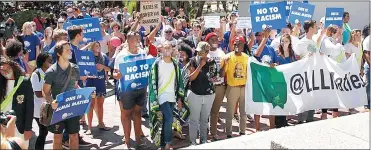  ?? Picture: GEORGE XANDER VON BERG ?? TOGETHER WE STAND: Hundreds of Stellenbos­ch University students held a peaceful march in Victoria Street on Friday in protest against students who were proponents of alleged racist attacks in the town.