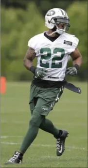  ?? JULIO CORTEZ — THE ASSOCIATED PRESS FILE ?? In this May 23 photo, the New York Jets’ Matt Forte runs a drill during the NFL football practice in Florham Park, N.J. When some Jets fans suggest the team is tanking the upcoming season, or, should, to get a high draft pick next spring, the veteran...