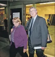  ?? Luis Sinco Los Angeles Times ?? FORMER Times sports columnist T.J. Simers and his wife, Ginny, leave a courthouse in L.A. in 2015.