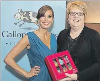  ?? SUBMITTED PHOTO ?? Actress Teri Hatcher, left, is shown with Joanne Schmidt and the Galloping Cows Oscar Box at the 89th Oscar gifting suite. It was the first major marketing milestone for the Port Hood business but it took a toll on Schmidt’s health due to bright lights...