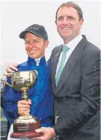  ??  ?? Charlie Appleby, who sends out Space Blues at Nottingham, with jockey Kerrin McEvoy after Cross Counter won the Melbourne Cup.