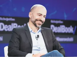  ?? Mike Cohen / New York Times ?? Dara Khosrowsha­hi, the chief executive of Uber, speaks at this week’s DealBook conference in New York.