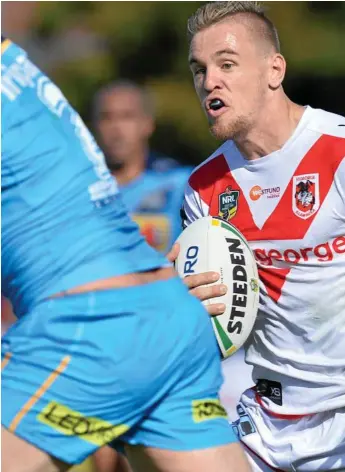  ?? PhotoS: Kevin Farmer ?? HAT-TRICK HERO: St George Illawarra Dragons player Matthew Dufty scored three tries in his side’s 54-8 win over the Gold Coast Titans at Clive Berghofer Stadium.