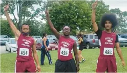  ?? SOUTHLAND COLLEGE PREP ?? Farrow, center, is flanked by teammates Leon DuBose, left, and Blaze Atwood on Sept. 4, the day Farrow ran his first race since being diagnosed with MS and learning to walk again.