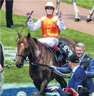  ?? PHOTO: GETTY IMAGES ?? Deliveranc­e . . . Craig Williams celebrates winning the Melbourne Cup on Vow And Declare at Flemington Racecourse yesterday. It was the Victorian jockey’s 16th ride in the race.