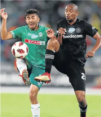  ?? Picture: GALLO IMAGES/ANESH DEBIKY ?? GET THAT BALL: AmaZulu’s Emiliano Tade, left, and Xola Mlambo of Orlando Pirates battle for the ball during their quarterfin­al knockout match at the Moses Mabhida Stadium in Durban on Saturday.