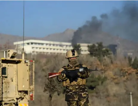  ?? WAKIL KOHSAR/AFP/GETTY IMAGES ?? The Taliban claimed responsibi­lity for Saturday’s attack at the heavily guarded Interconti­nental Hotel in Kabul, which is popular among foreigners.