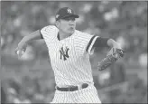  ?? FRANK FRANKLIN II/AP ?? Starting pitcher Masahiro Tanaka delivers against the Minnesota Twins in the first inning of Saturday’s Game 2.