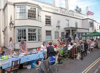  ?? ?? Hip hip hooray: Topsham’s Longest Table street party for the Queen’s jubilee