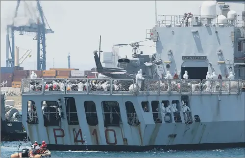  ??  ?? The Italian navy ship Orione enters the port of Valencia carrying migrants who have been at the centre of a major migration row between EU states.