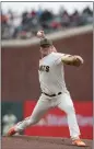  ?? GODOFREDO A. VÁSQUEZ — AP PHOTO ?? San Francisco Giants pitcher Logan Webb throws against the Miami Marlins during the first inning of a baseball game in San Francisco.