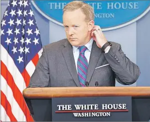  ?? AP PHOTO ?? White House press secretary Sean Spicer listens to a question during the daily press briefing Monday at the White House in Washington.