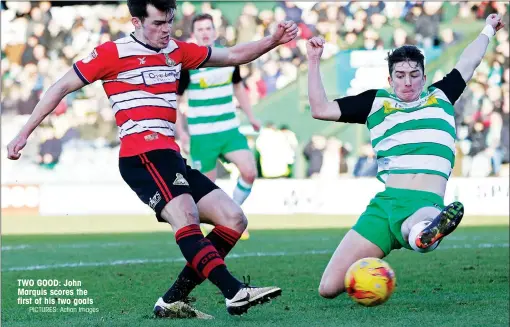  ?? PICTURES: Action Images ?? TWO GOOD: John Marquis scores the first of his two goals