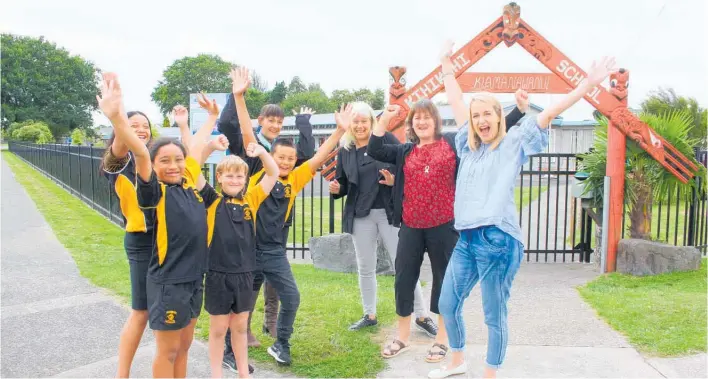  ?? Photo / Dean Taylor ?? Elation at Kihikihi School with news of amassive government funding injection into safewalkin­g and cycleways. Celebratin­g are Kihikihi School principal Sunny West (back left), with students (from left) Te Oriwe heke, Hana Tuhua-Tamaiva, Ryan Bull and Wiremu Kapa and (from right) Waipā Mayor Susan O’Regan, Deputy Mayor Liz Stolwyk and Te Awamutu-Kihikihi Community Board chairwoman Ange Holt.