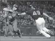  ?? ASSOCIATED PRESS ?? ARIZONA DIAMONDBAC­KS’ Tim Locastro (left) is tagged out by San Francisco Giants’ Sam Dyson (49) during the seventh inning of a baseball game Saturday in San Francisco.