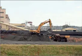  ?? Doug Walker / RN-T ?? Coal ash removal continues at Plant Hammond as part of the Clean Coal program that was initiated by the Obama administra­tion and which the Trump administra­tion is seeking to gut.