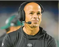  ?? DAVID RICHARD/AP ?? Jets head coach Robert Saleh looks at the scoreboard during the first half of the exhibition Hall of Fame game against the Cleveland Browns on Thursday in Canton, Ohio.