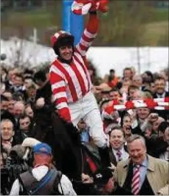  ??  ?? Barry Geraghty being led in after winning the 2009 Arkle Chase with Forpadydep­lasterer.