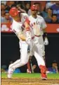  ?? Kent Nishimura Los Angeles Times ?? MIKE TROUT hits a two-run home run to tie the score 3-3 in the seventh inning.