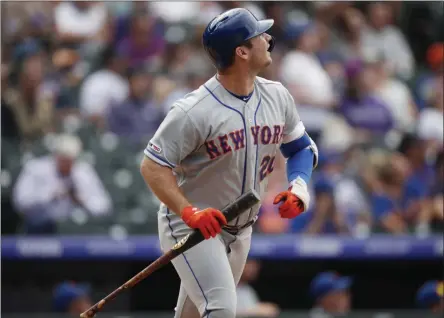  ?? DAVID ZALUBOWSKI - THE ASSOCIATED PRESS ?? New York Mets’ Pete Alonso follows the flight of his solo home run off Colorado Rockies starting pitcher Jeff Hoffman in the sixth inning of a baseball game Wednesday, Sept. 18, 2019, in Denver.