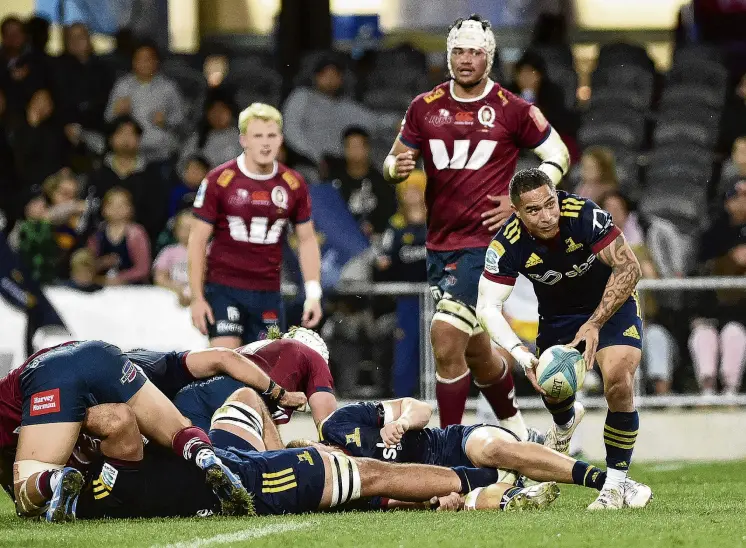  ?? PHOTO: GREGOR RICHARDSON ?? Cherish the sight . . . Halfback Aaron Smith, in his final home game for the Highlander­s, clears the ball from a ruck against the Reds at Forsyth Barr Stadium last night.