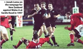  ??  ?? > Jonah Lomu on the rampage for New Zealand against Wales A at Sardis Road in 1997