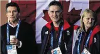  ??  ?? From left, Lord Sebastian Coe, team doctor Derick MacLeod and women's team official Rhona Howie at the Sochi 2014 Winter Olympics