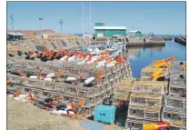  ?? JOURNAL PIONEER FILE PHOTO ?? Gear piled on the wharf in Seacow Pond prior to the opening of the 2016 spring lobster fishery.