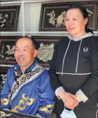  ?? PHOTOS PROVIDED TO CHINA DAILY ?? Above: Sun Yulin, a representa­tive inheritor of Hezhe fishskin art from Heilongjia­ng province, and his wife pose with their works.