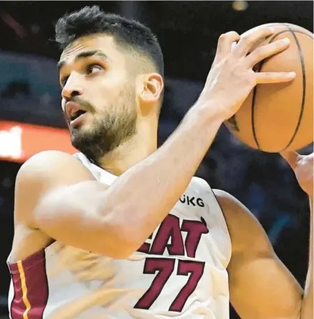  ?? LYNNE SLADKY/AP ?? Miami Heat center Omer Yurtseven, above, has a big fan in Udonis Haslem, but may still have to win over coach Erik Spoelstra.