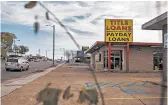  ?? JOE BUGLEWICZ/THE NEW YORK TIMES ?? A payday loan business in Decatur, Ala., in 2017. The Consumer Financial Protection Bureau has scrapped a plan to impose new limits on payday lending.