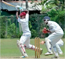  ??  ?? Richmond batsman Avindu Thikshana in action against Royal - Pic by Ranjith Perera