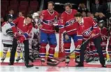  ?? CHRISTINNE MUSCHI/REUTERS ?? Prime Minister Justin Trudeau and Chinese Premier Li Keqiang face off at the Bell Centre in Montreal.