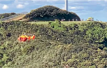  ?? DOC WATSON ?? The accident near Brooklyn’s wind turbine on Sunday, where a mountain biker broke their leg and was airlifted to hospital.