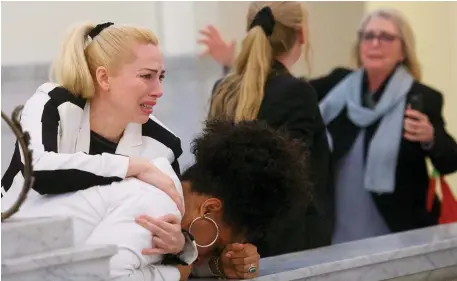  ?? Photo: Mark Makela ?? Cosby accusers (left to right) Caroline Heldman, Lili Bernard and Victoria Valentino react after Bill Cosby was found guilty on all counts in his sexual assault retrial at Montgomery County Courthouse in Norristown, Pennsylvan­ia.