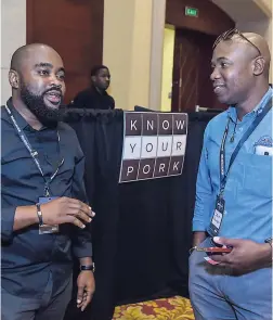  ??  ?? Kitchen manager at Rick’s Café, Dwayne Smalling (left), speaks with CB Foods’ sales manager Craig Plunkett at day two of the Making The Cut seminar.